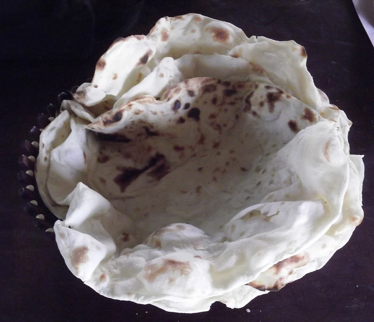 Yufka from the shared thin-bread tradition; not a depiction of katyrma itself.