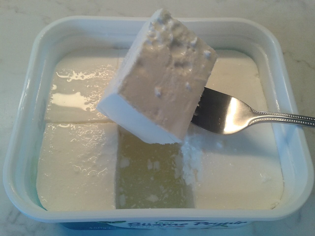 Modern white cheese illustrates dairy products; it is not a Hittite recipe.