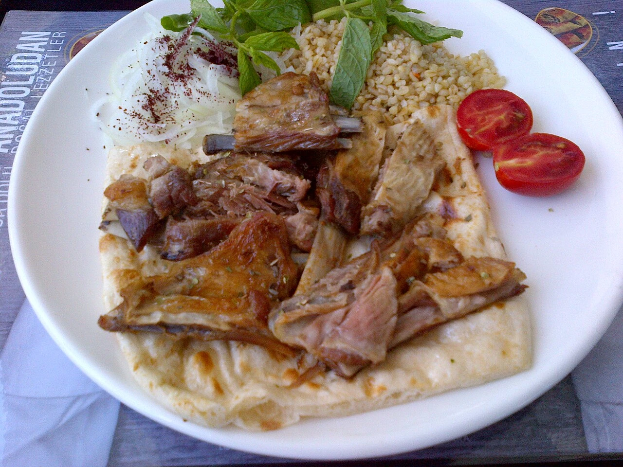 Kuyu kebab, a contemporary lamb dish related to the biryan family.