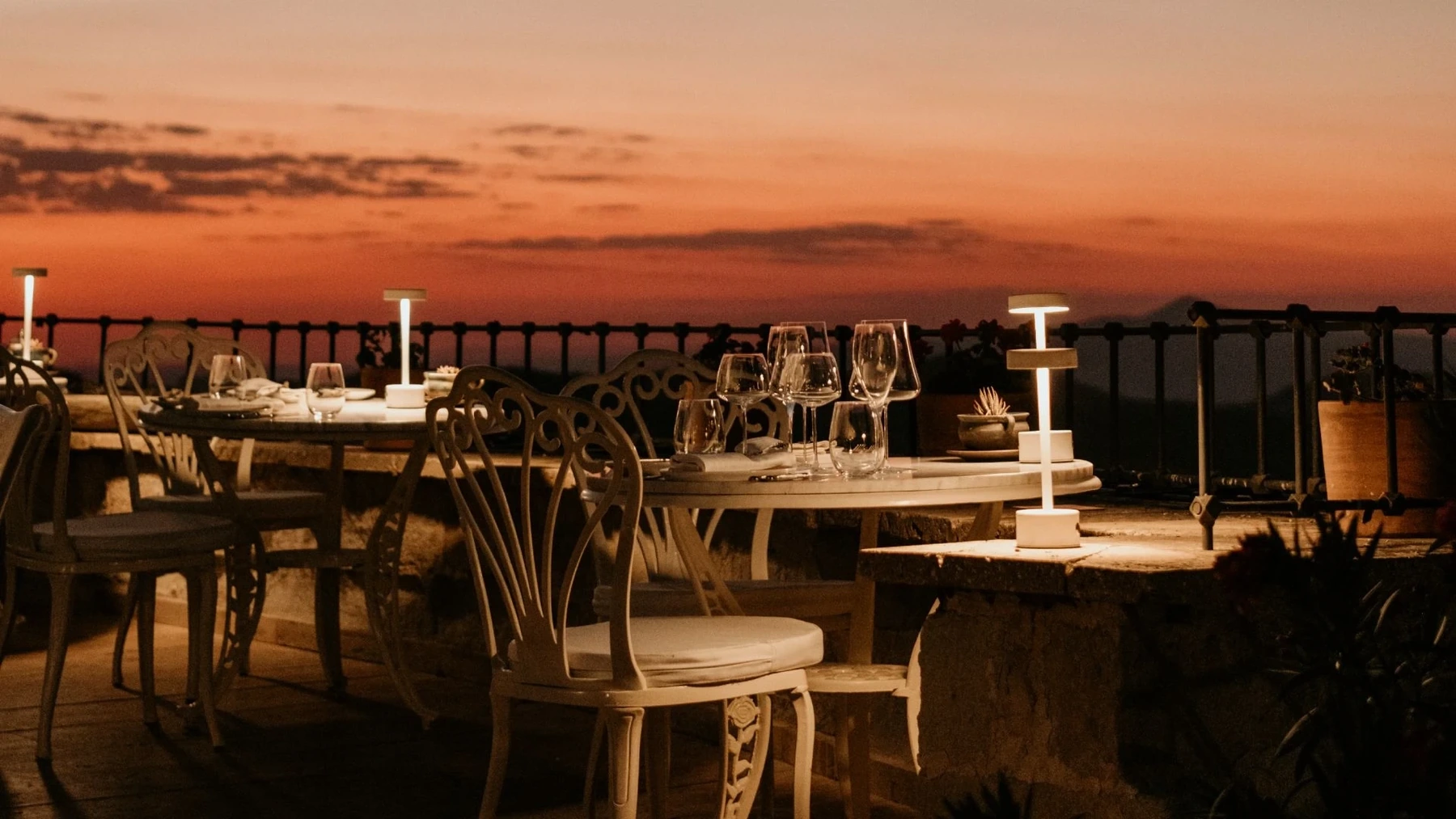 Lil’a outdoor dining terrace at sunset