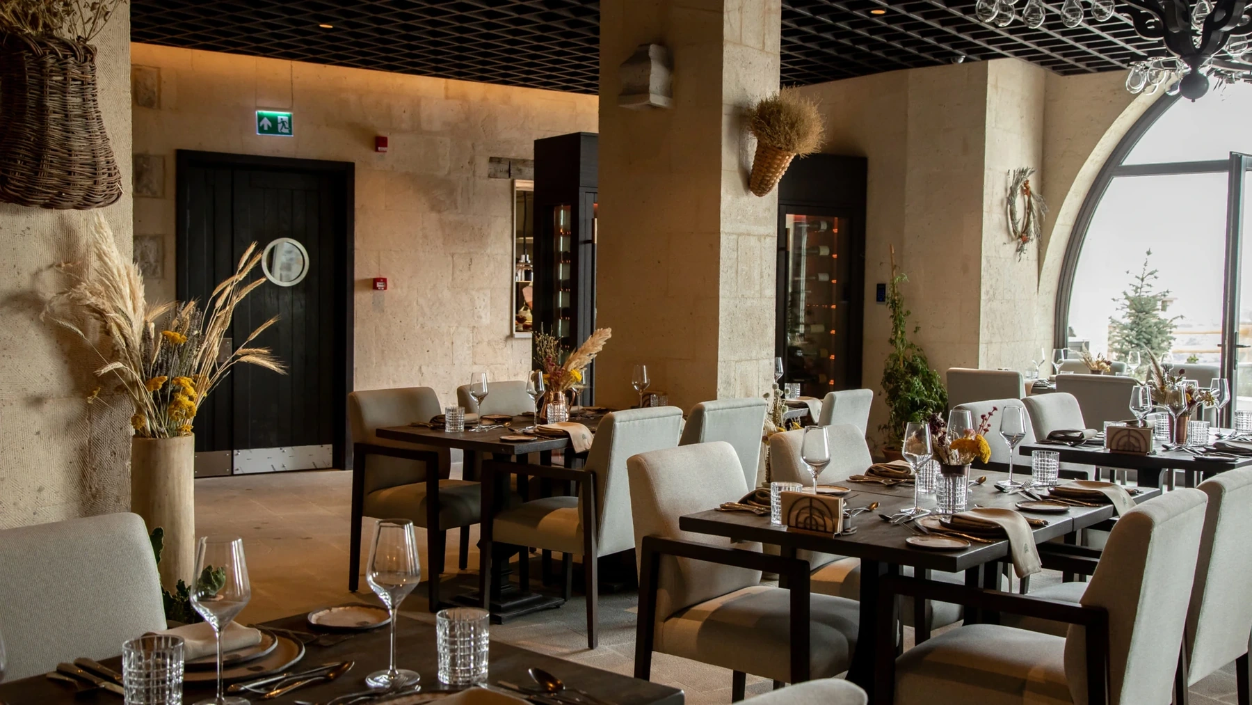 Nahita restaurant stone dining interior at Argos; no separate restaurant terrace photo verified