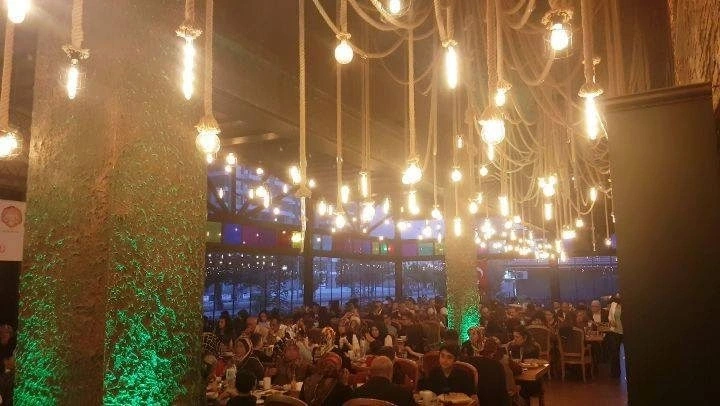 Sofram Restaurant dining room during an iftar event; public poster from the restaurant’s own video